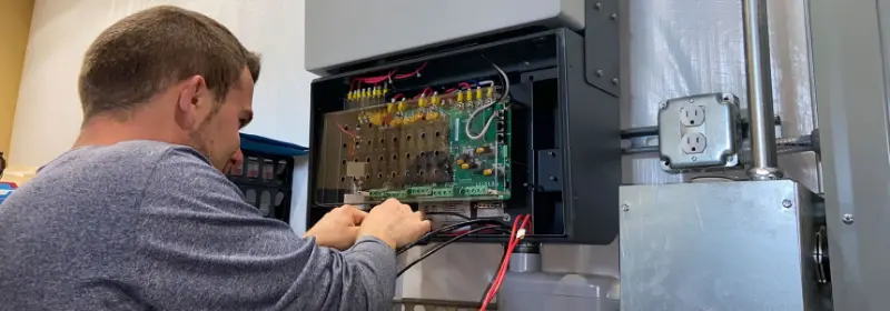Example: Technician working on solar electrical equipment